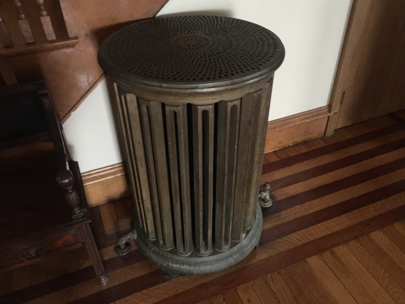 Radiator at the base of the main staircase. There were four other staircases in the house.